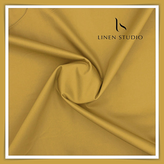 2 Ply 100% Cotton Suiting by Burgoyne Ireland - Brass (Satin Finish)