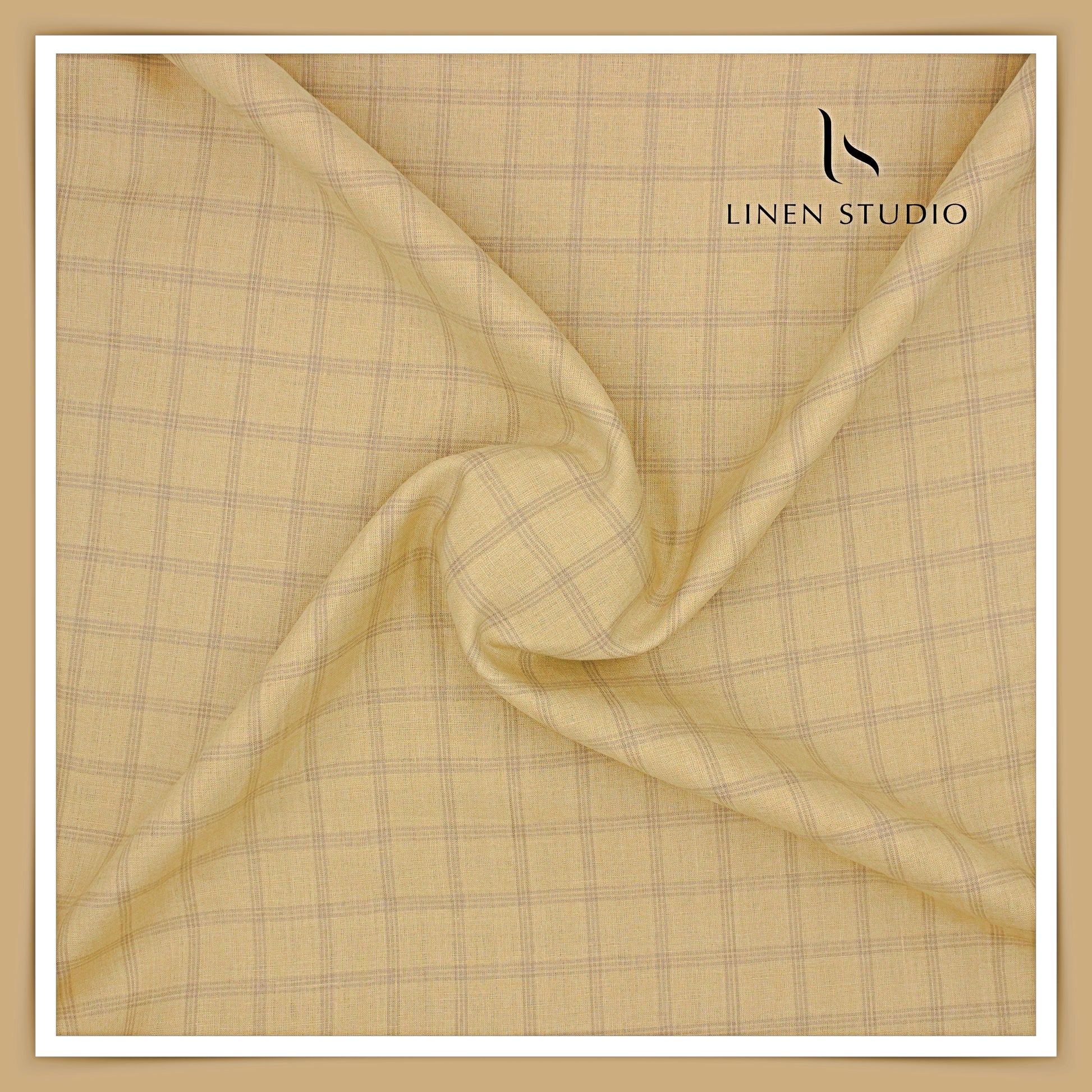 Checkered fabric with a subtle pattern on a beige background, featuring the brand 'Linen Studio'.