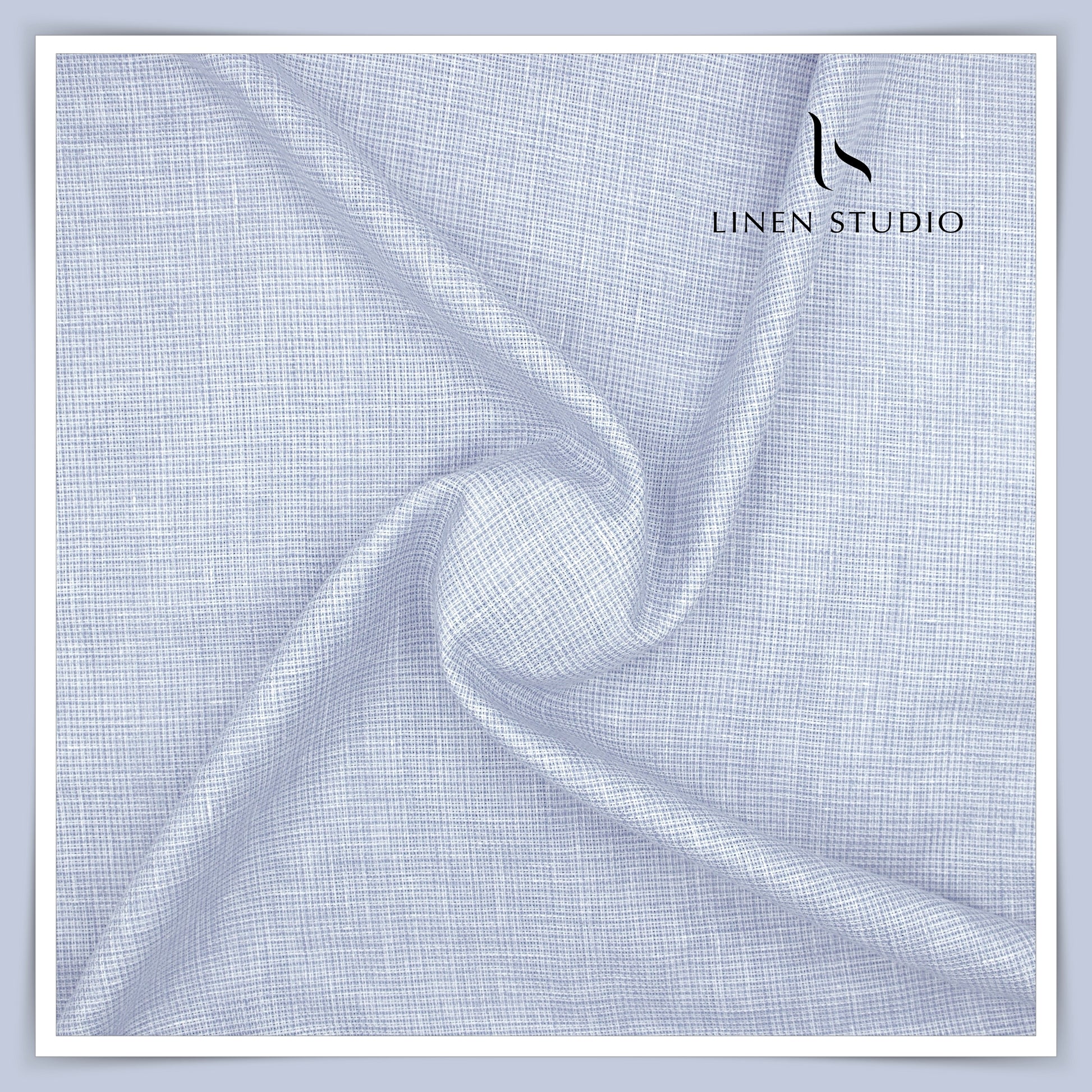 Linen fabric with a subtle check pattern on a light gray background, featuring the Linen Studio logo.